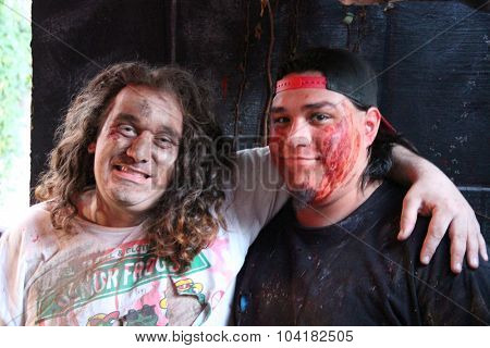 MUSKOGEE, OK - Sept. 12: An male actor pretending to be a zombie poses for a picture during the Castle Zombie Run at the Castle of Muskogee in Muskogee, OK on September 12, 2015. 
