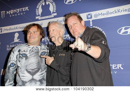 MOORPARK, CA - OCT 5: Jack Black, Robbie Krieger & Scotty Medlock arrive at the 8th Annual Medlock/Krieger Invitational Golf Concert at the Moorpark Country Club in Moorepark, CA on October 5, 2015.