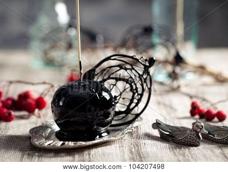 Halloween black and red caramelized apples