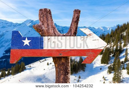 Chile Flag wooden sign with winter background