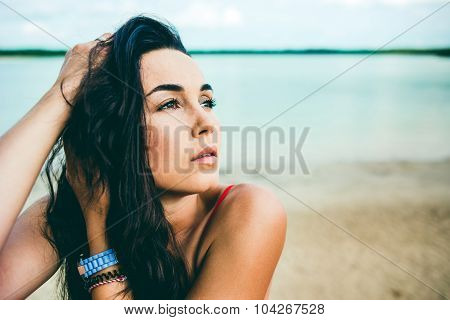 Long Hair Girl Relaxing On The Beach