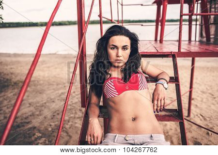 Long Hair Girl Relaxing On The Beach