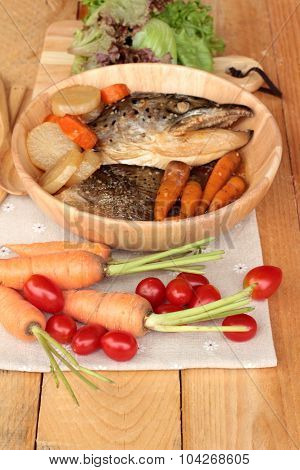 Salmon Head Cooked Of Tari Yaki Sauce With Fresh Vegetables.