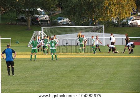 Football Players Preparing For A Match