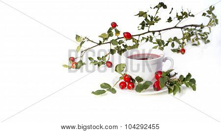 Cup of tea with wild roses on white background