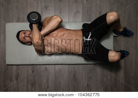 Healthy Man Doing Triceps Excerise On Foor