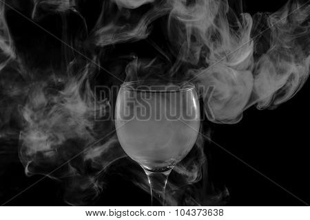 Smoke Shisha In Cocktail Glass On A Black Background.