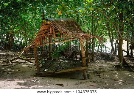 Dilapidated Nipa Rest House Near A Tourist Beach In Thailand