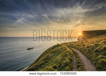 Stunning Natural Cove Coastal Landscape At Sunset With Beautiful Vibrant Sky