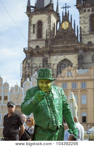 Green meme posing on old Town Square