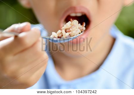 Boy Eat Thai Rice.