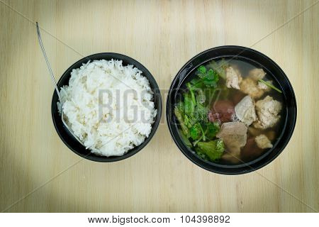 Pork soup made from pork bone with Ma-Li rice.break fast or diner Thai food