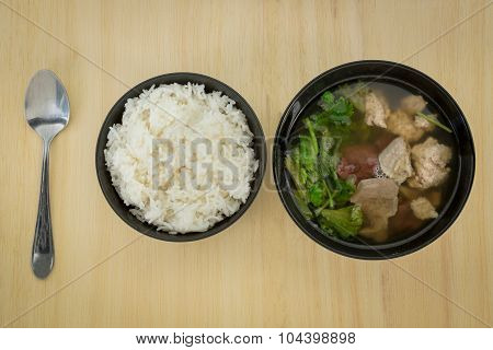Pork soup made from pork bone with Ma-Li rice.break fast or diner Thai food