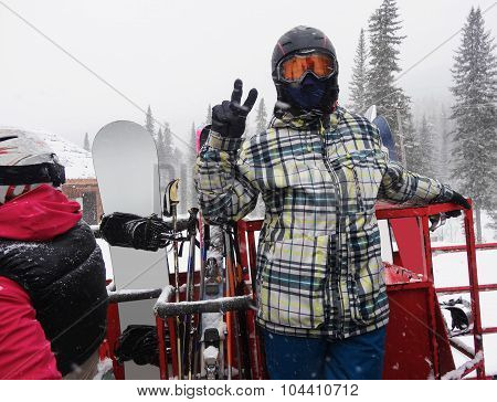 Snowboarder On The Snowcat