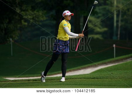 KUALA LUMPUR, MALAYSIA - OCTOBER 09, 2015: Thailand's Pornapong Phatlum plays from 6th hole fairway of the Kuala Lumpur Golf & Country Club at the 2015 Sime Darby LPGA Malaysia golf tournament.