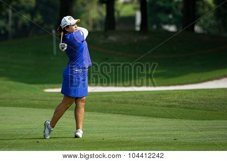 KUALA LUMPUR, MALAYSIA - OCTOBER 09, 2015: South Korea's Inbee Park plays on the fairway of the Kuala Lumpur Golf & Country Club at the 2015 Sime Darby LPGA Malaysia golf tournament.