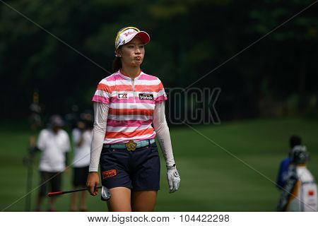 KUALA LUMPUR, MALAYSIA - OCTOBER 09, 2015: South Korea's Chella Choi reacts after her shot at the 6th hole fairway at the KL Golf & Country Club at the 2015 Sime Darby LPGA Malaysia golf tournament.