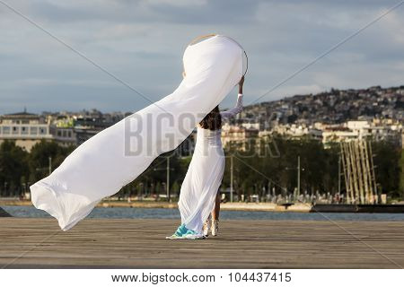Models Walk An During  Outdoor Fashion Show With Clothing Made Out Of Recycled Materials Was Held In
