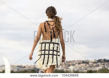 Models Walk An During  Outdoor Fashion Show With Clothing Made Out Of Recycled Materials Was Held In