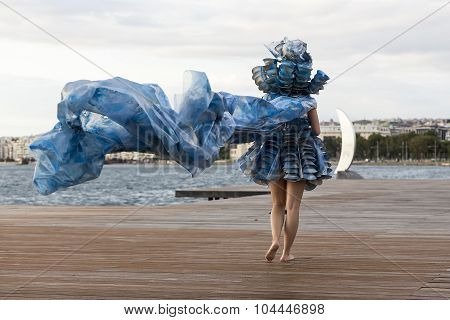 Models Walk An During  Outdoor Fashion Show With Clothing Made Out Of Recycled Materials Was Held In