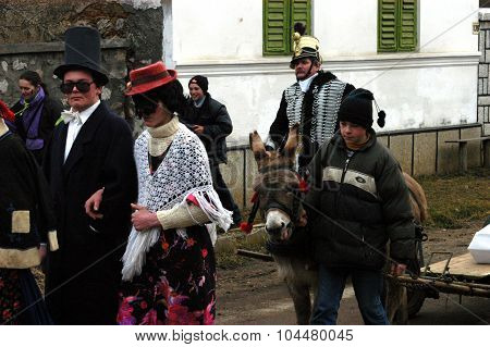 People In Traditional Costumes Celebrating The Winter Carnival