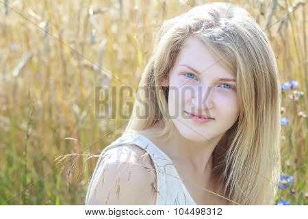 Day Outdoor Headshot Portrait Of Blonde Girl At Rye Ears Field Background