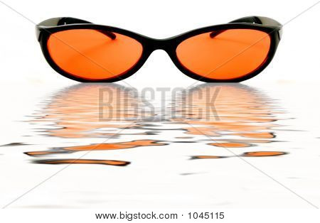 Oranžové sklenice vody