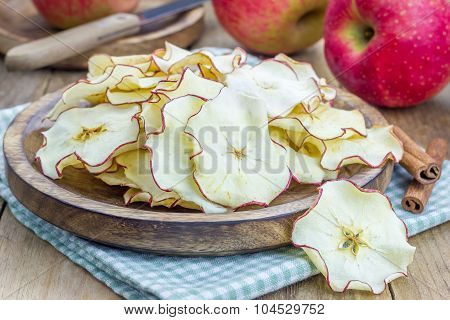 Healthy Snack. Homemade Apple Chips On Rustic Wooden Background