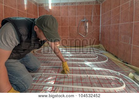 pipefitter installing system of heating