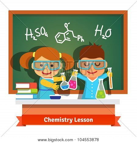 Kids having fun at chemistry lesson