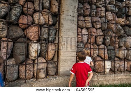 Moscow, Russia - September 25, 2015:  City artistic park Muzeon. Victims of totalitarian regime, author Chubarov. Fragment, children.