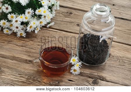 Tea With A Bouquet Of Daisies