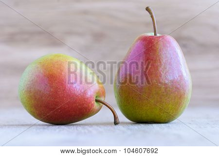 Two Pears On A Old Wooden Table, Closeup