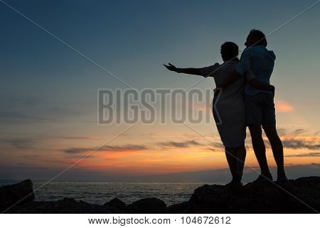 Inlove Couple On The Seacoast At Sunset Time