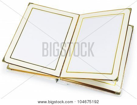 Opened book with blank pages and decorative frame for text