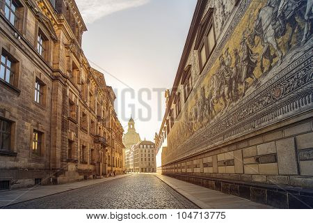 city center of Dresden, Germany, with historic buildings and the Fuerstenzug (Procession of Princes), a giant mural