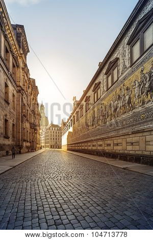 city center of Dresden, Germany, with historic buildings and the Fuerstenzug (Procession of Princes), a giant mural