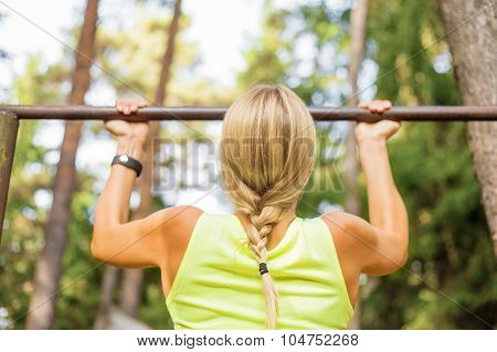 Woman doing pullups