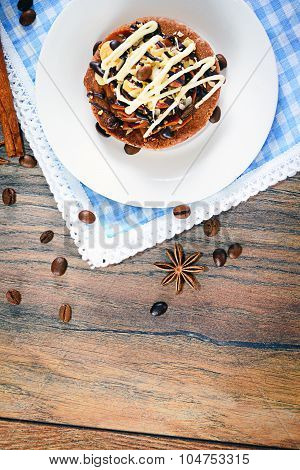Chocolate Nut Cake on Vintage Retro Woody Background