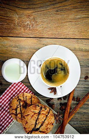 Coffee with Bakery on Woody Retro Background