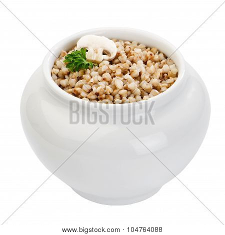 ceramic pot with boiled buckwheat isolated on white background