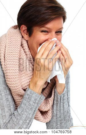 Woman with facial tissue having rheum. Health care.