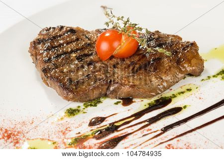 Grilled steaks and vegetables