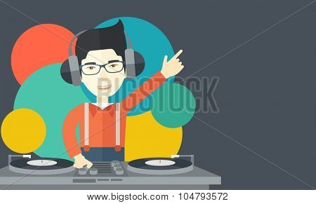 An Asian DJ wearing headphones and glasses with hand up playing vinyl vector flat design illustration. Horizontal layout with a text space.