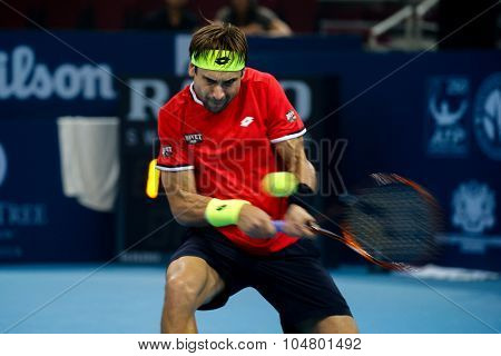 KUALA LUMPUR, MALAYSIA - OCTOBER 03, 2015: Spain's tennis player David Ferrer plays a backhand return at the 2015 Malaysian Open tennis tournament from Sep 26 - Oct 4, 2015 in Stadium Putra.