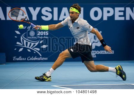 KUALA LUMPUR, MALAYSIA - OCTOBER 03, 2015: Spain's tennis player David Ferrer plays a forehand return at the 2015 Malaysian Open tennis tournament from Sep 26 - Oct 4, 2015 in Stadium Putra.