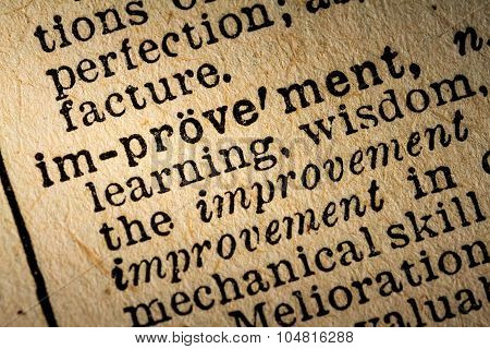 Close-up Of The Word Improvement And Its Definition