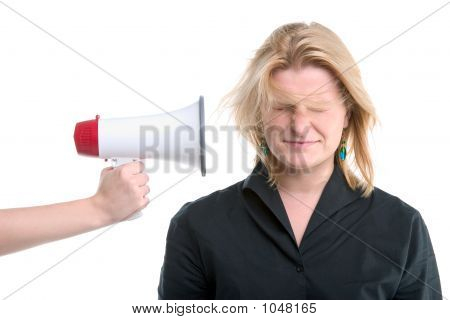 Businesswoman With Megaphone Held To Her Head
