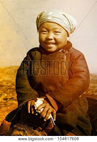 Young Tsaatan Girl with a Beautiful Smile Concept