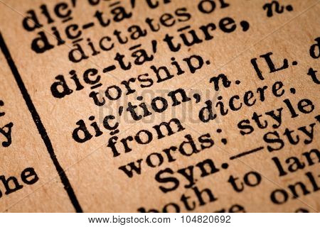 Close-up Of An Opened Dictionary Showing The Word Diction